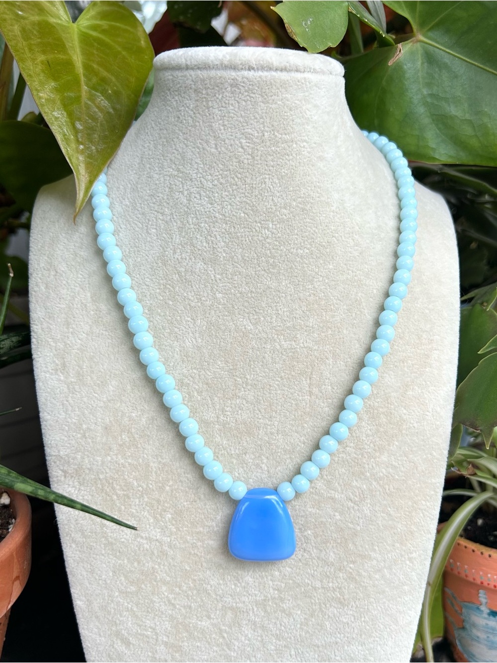 Blue necklace with pendant
